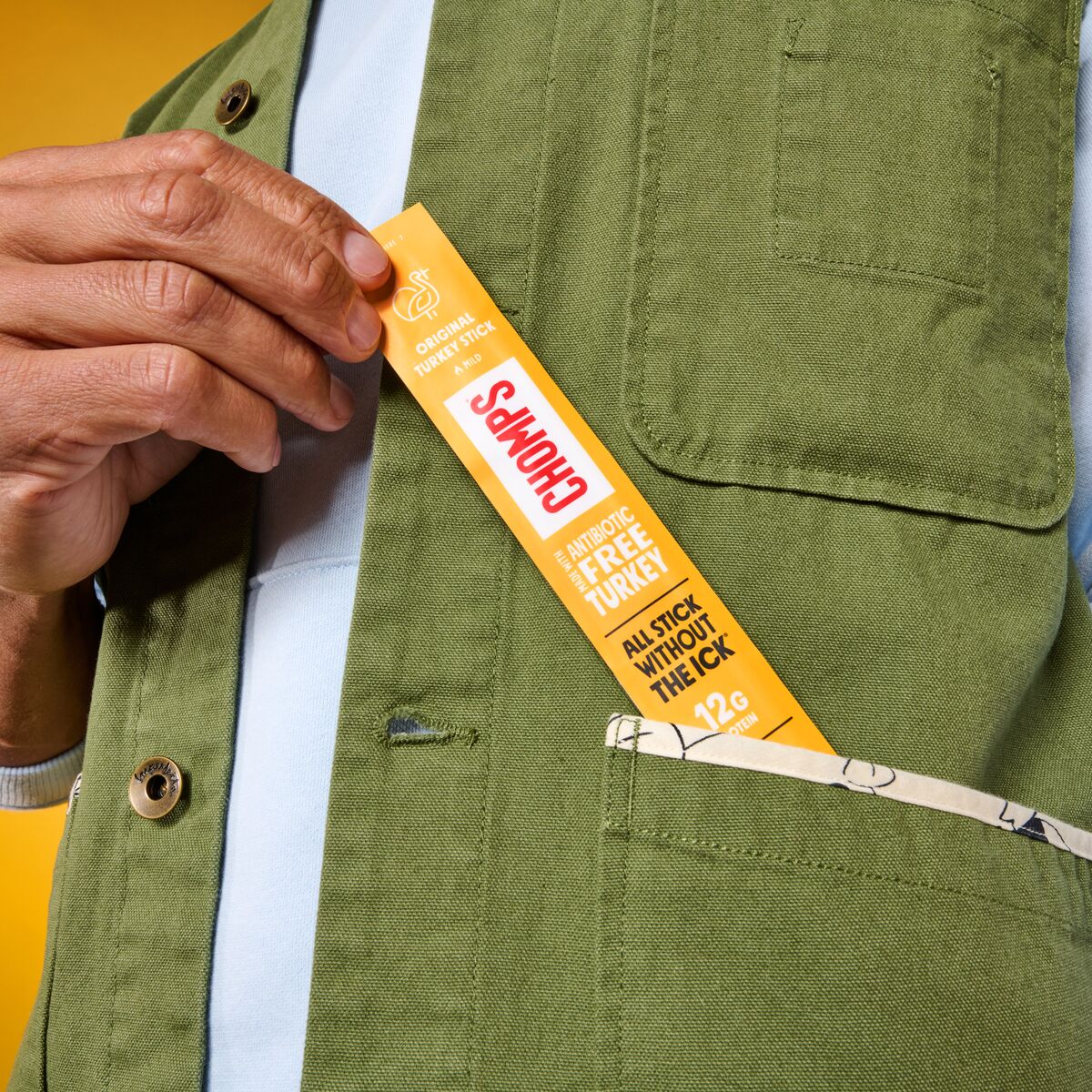 Chomps snack in a green jacket pocket